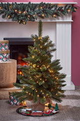 Triumph Tree Forest frosted kerstboom w burlap groen TIPS 106 - h90xd62cm